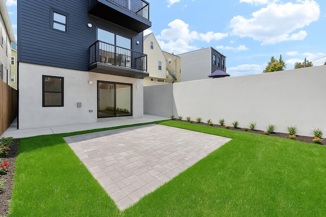 166 New York Ave, Jersey City, NJ 07307 - fenced backyard featuring a balcony and a patio