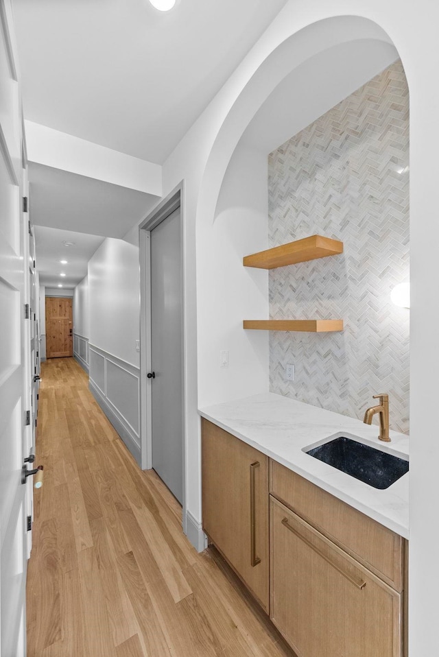 166 New York Ave, Jersey City, NJ 07307 - corridor with a sink and light wood-type flooring