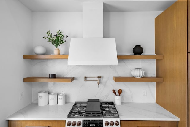 166 New York Ave, Jersey City, NJ 07307 - kitchen featuring open shelves, range, brown cabinetry, and light stone counters