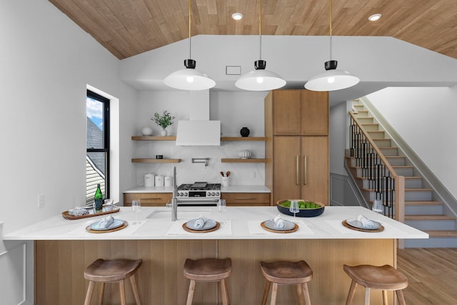 166 New York Ave, Jersey City, NJ 07307 - kitchen featuring open shelves, vaulted ceiling, brown cabinets, wooden ceiling, and a peninsula