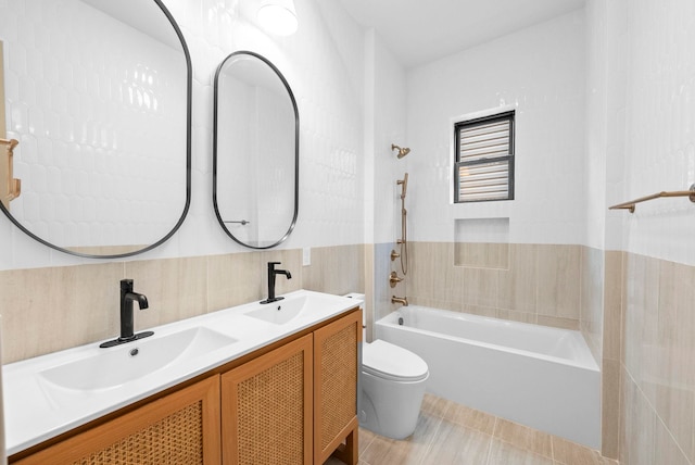 166 New York Ave, Jersey City, NJ 07307 - bathroom with tub / shower combination, double vanity, and tile walls