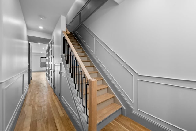 166 New York Ave, Jersey City, NJ 07307 - stairway featuring wood finished floors and recessed lighting