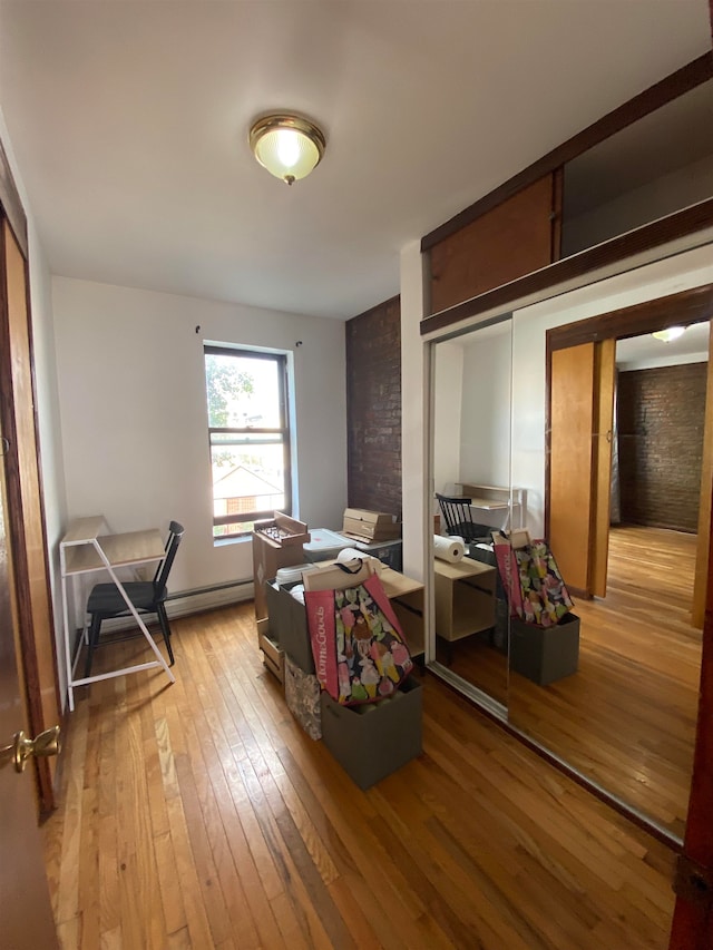 bedroom with a closet and light wood-type flooring