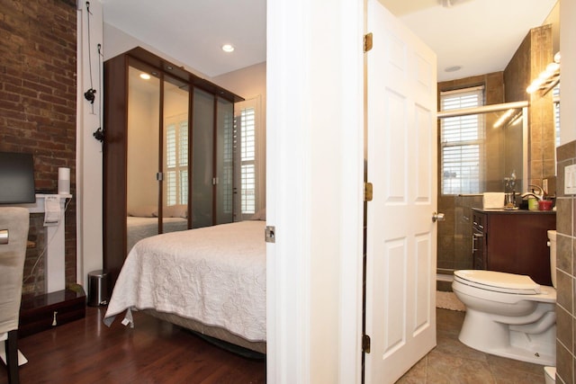 bedroom featuring wood-type flooring