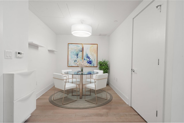 dining room featuring light hardwood / wood-style floors