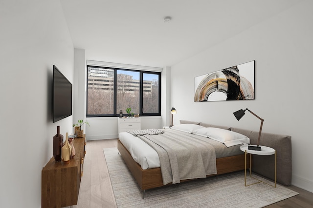 bedroom featuring hardwood / wood-style floors