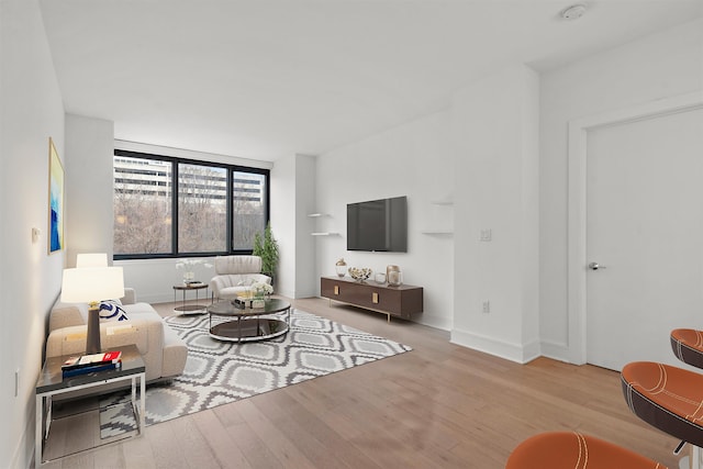 living room featuring light wood-type flooring