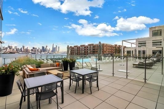 view of patio / terrace featuring an outdoor hangout area