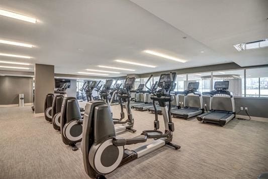 gym with light colored carpet