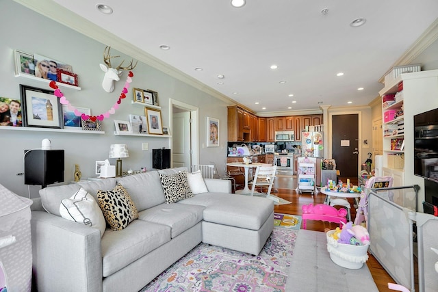 20 Avenue At Port Imperial Unit 217, West New York, NJ 07093 - living room featuring wood finished floors, recessed lighting, and crown molding
