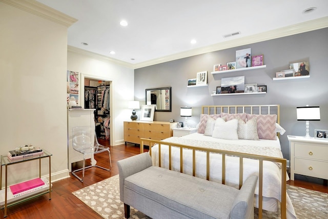 20 Avenue At Port Imperial Unit 217, West New York, NJ 07093 - bedroom featuring ornamental molding, a spacious closet, wood finished floors, and recessed lighting