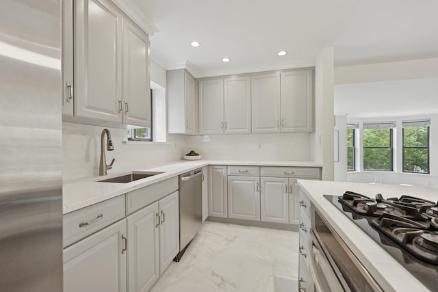 48 W Hamilton Pl Unit 5, Jersey City, NJ 07302 - kitchen featuring appliances with stainless steel finishes, plenty of natural light, light countertops, light marble finish flooring, and recessed lighting