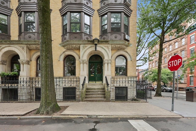 48 W Hamilton Pl Unit 5, Jersey City, NJ 07302 - view of property featuring a fenced front yard