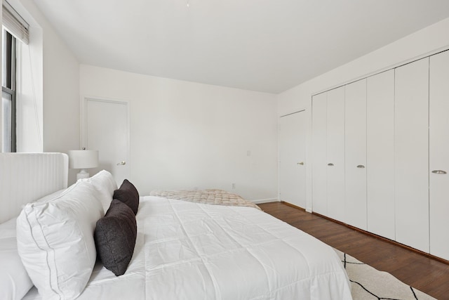 48 W Hamilton Pl Unit 5, Jersey City, NJ 07302 - bedroom featuring dark wood-style floors and a closet