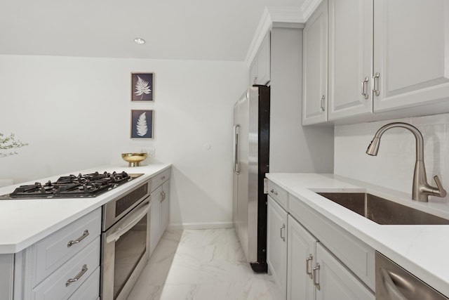48 W Hamilton Pl Unit 5, Jersey City, NJ 07302 - kitchen with stainless steel appliances, light marble finish floors, backsplash, and white cabinets