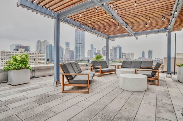 25 Mcwilliams Pl Unit 402, Jersey City, NJ 07302 - view of patio with a skyline view, an outdoor hangout area, and a pergola