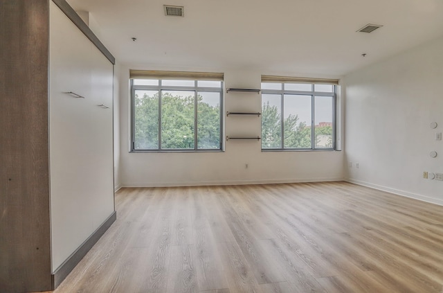 25 Mcwilliams Pl Unit 402, Jersey City, NJ 07302 - empty room featuring light wood-style floors and baseboards