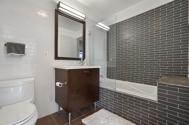 25 Mcwilliams Pl Unit 402, Jersey City, NJ 07302 - bathroom featuring toilet, tiled shower / bath, and vanity