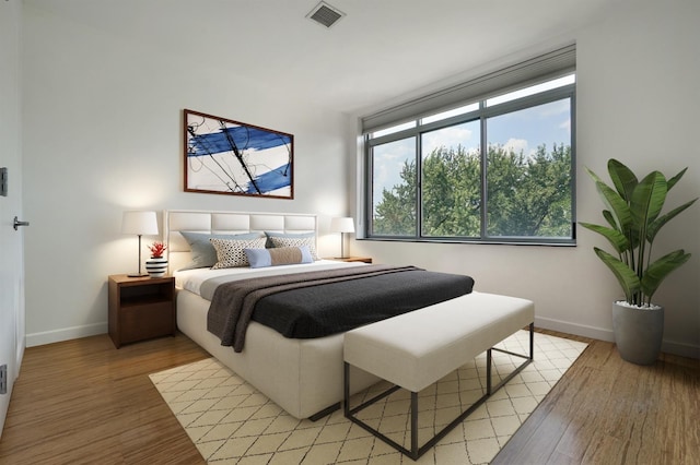 25 Mcwilliams Pl Unit 402, Jersey City, NJ 07302 - bedroom featuring baseboards, visible vents, and light wood-style flooring