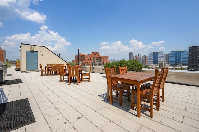 25 Mcwilliams Pl Unit 402, Jersey City, NJ 07302 - deck with a city view, outdoor dining area, and a patio area