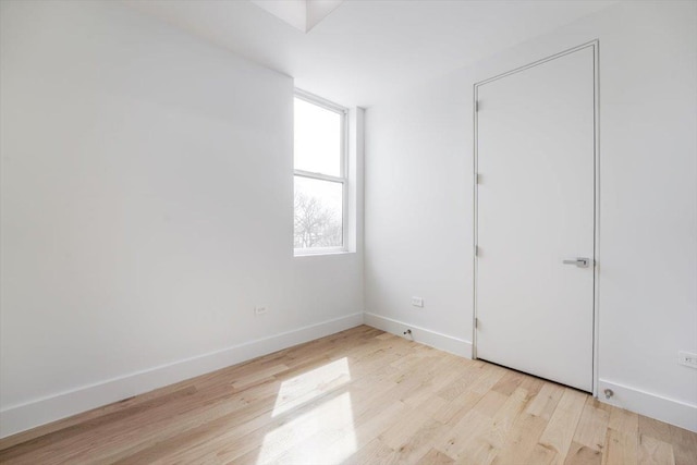 91 Pearsall Ave Unit 2, Jersey City, NJ 07305 - unfurnished bedroom featuring baseboards and light wood-type flooring