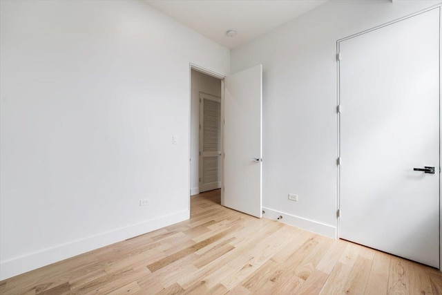 91 Pearsall Ave Unit 2, Jersey City, NJ 07305 - unfurnished bedroom featuring light wood-style floors and baseboards