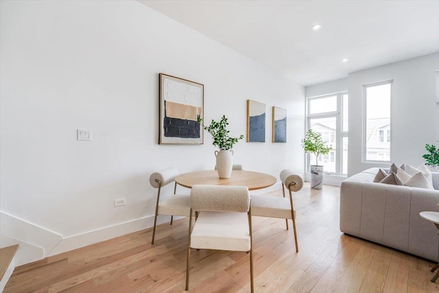 91 Pearsall Ave Unit 2, Jersey City, NJ 07305 - dining room with light wood-type flooring, recessed lighting, and baseboards