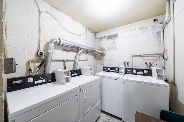 1604 74th St Unit D15, North Bergen, NJ 07047 - shared laundry featuring independent washer and dryer and concrete block wall