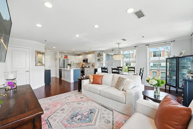 812 Grand St Unit 510, Hoboken, NJ 07030 - living room featuring crown molding, dark wood-style floors, and recessed lighting