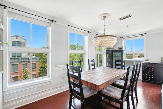 812 Grand St Unit 510, Hoboken, NJ 07030 - dining area with a chandelier, dark wood finished floors, and ornamental molding