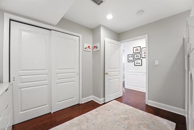 812 Grand St Unit 510, Hoboken, NJ 07030 - unfurnished bedroom with dark wood-type flooring, recessed lighting, and a closet