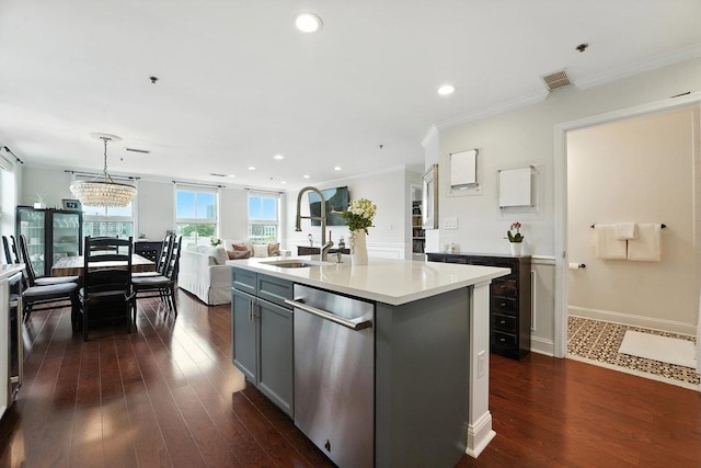 812 Grand St Unit 510, Hoboken, NJ 07030 - kitchen with dishwasher, gray cabinets, light countertops, dark wood-type flooring, and ornamental molding