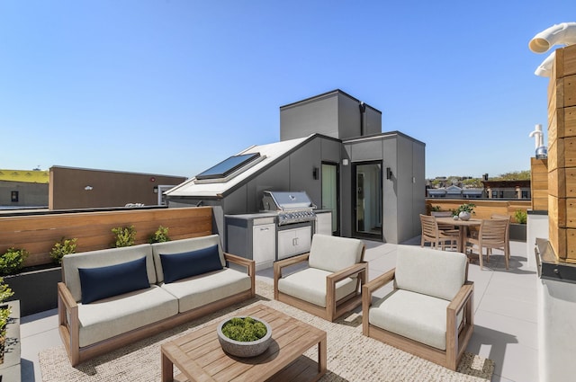 view of patio / terrace featuring an outdoor hangout area, outdoor dining area, area for grilling, and grilling area