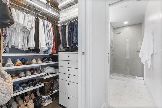 380 Newark Ave Unit 504, Jersey City, NJ 07302 - walk in closet featuring marble finish floors
