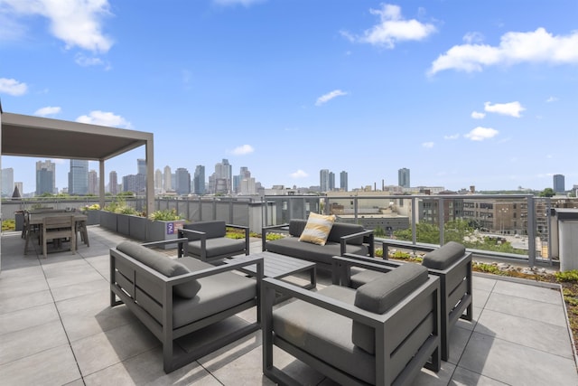 380 Newark Ave Unit 504, Jersey City, NJ 07302 - view of patio with a view of skyline, outdoor lounge area, and outdoor dining area