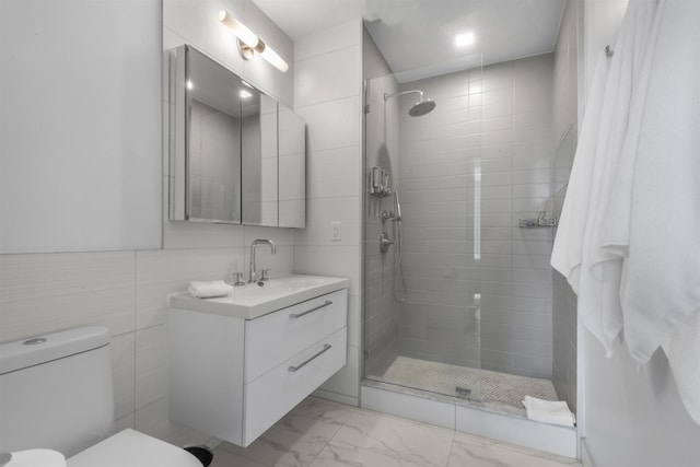 380 Newark Ave Unit 504, Jersey City, NJ 07302 - full bath featuring vanity, tiled shower, marble finish flooring, and tile walls