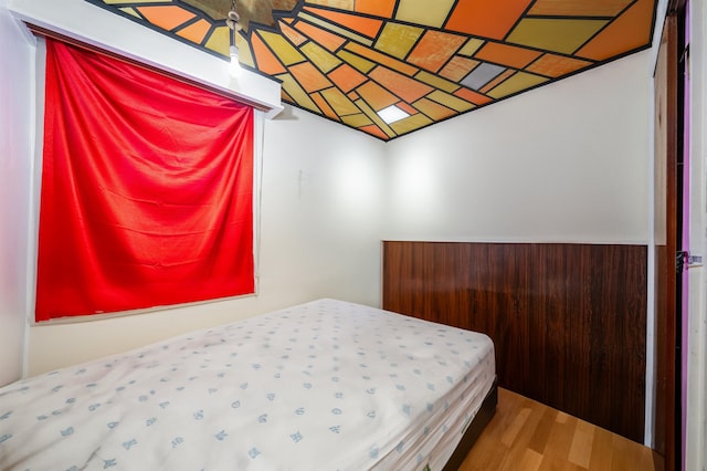 bedroom featuring hardwood / wood-style flooring