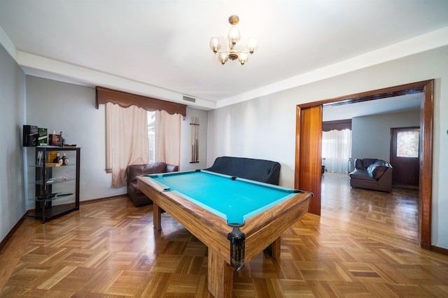 playroom with parquet flooring, pool table, and a chandelier