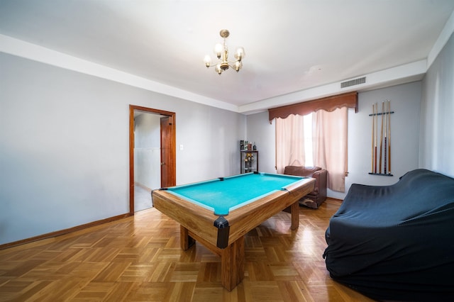 playroom featuring pool table, parquet flooring, and a chandelier