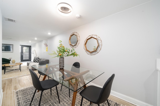 201 Zabriskie St Unit 1, Jersey City, NJ 07307 - dining space with light wood-style flooring and recessed lighting