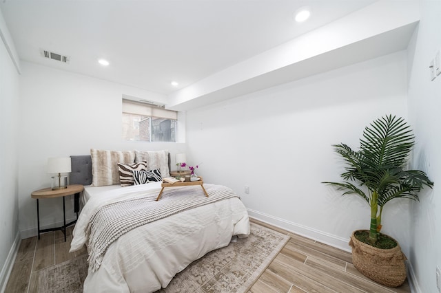 201 Zabriskie St Unit 1, Jersey City, NJ 07307 - bedroom with wood finished floors and recessed lighting