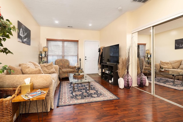 living room with dark hardwood / wood-style floors