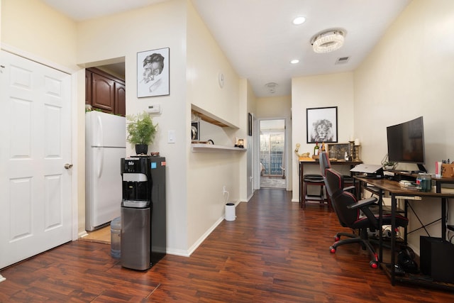 office with dark hardwood / wood-style floors