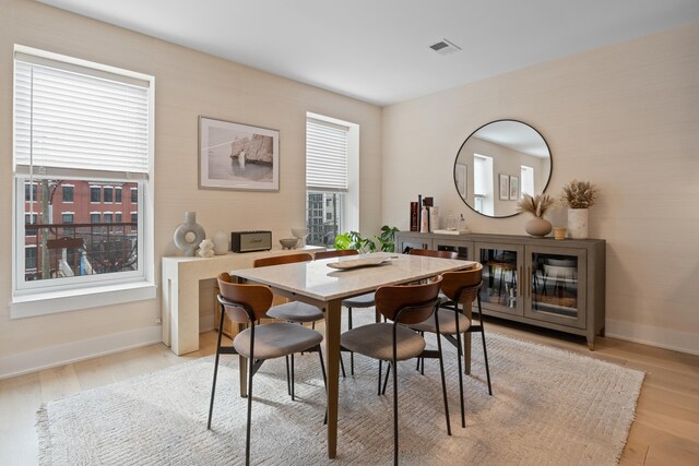 bedroom featuring multiple windows