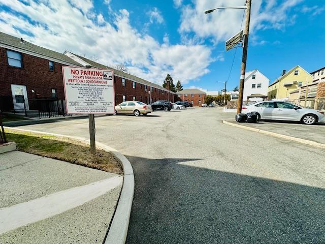 view of street with curbs and street lights