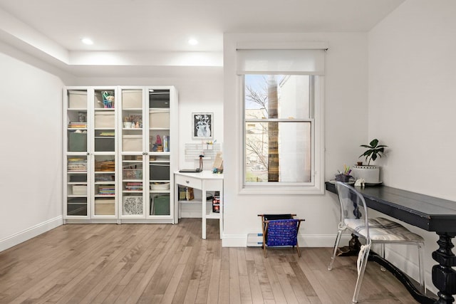 office area with hardwood / wood-style flooring