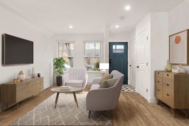 sitting room with light hardwood / wood-style floors