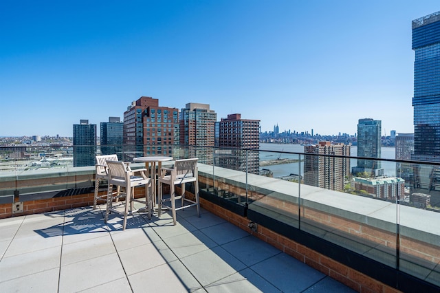 10 Provost St Unit 416, Jersey City, NJ 07302 - patio / terrace with a view of skyline and outdoor dining area