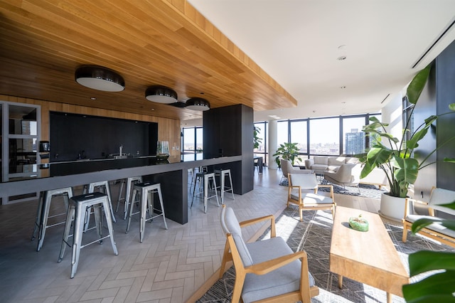 10 Provost St Unit 416, Jersey City, NJ 07302 - dining room featuring wood walls and floor to ceiling windows