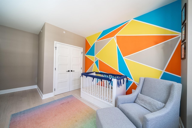 10 Provost St Unit 416, Jersey City, NJ 07302 - bedroom with wood finished floors and a closet